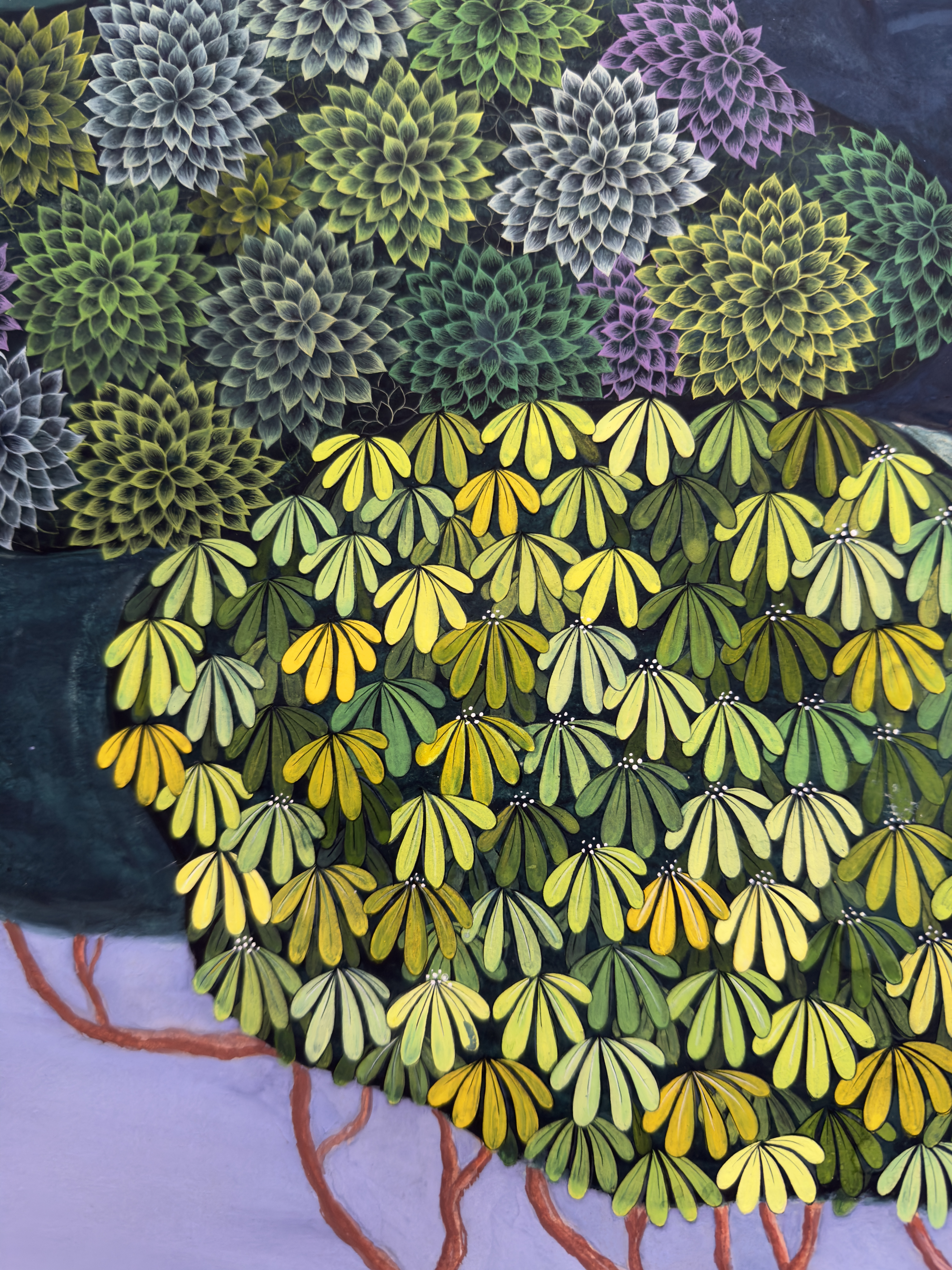 A painting consisting of bunches of colourful leaves.